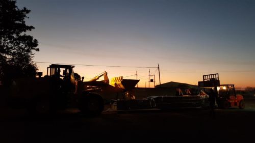 Loaders at night